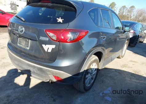 2013 Mazda Cx-5 Touring z USA, uszkodzony, nr VIN JM3KE2CE2D0124989